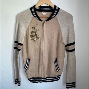 Black, Tan, and Cream Zip-Up Jacket